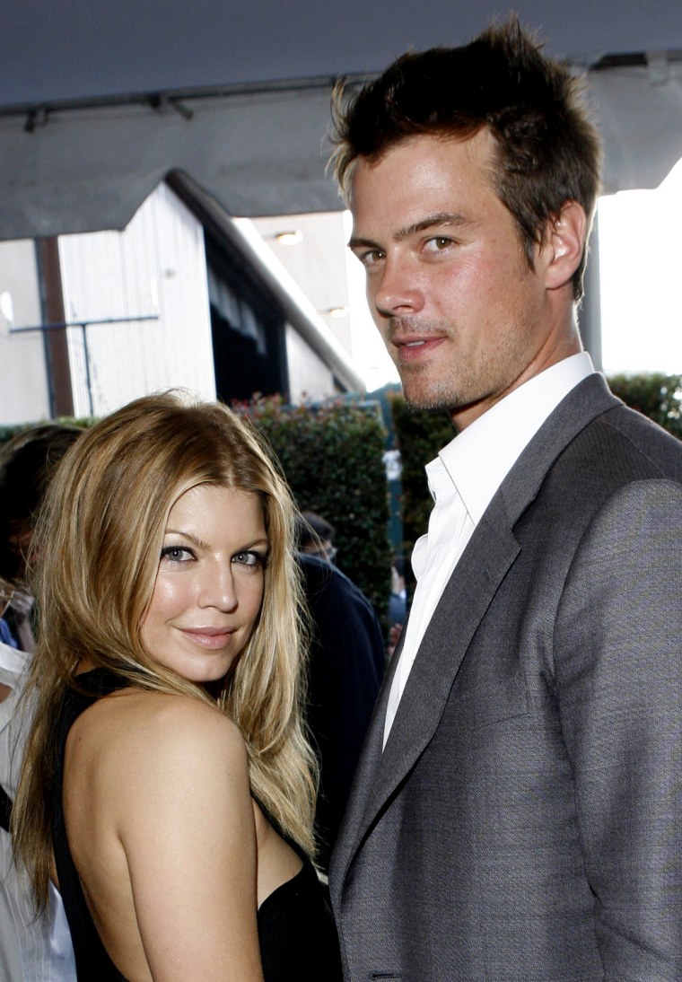 In this Sunday, June 3, 2007 picture, Fergie and Josh Duhamel arrive at the MTV Movie Awards in Los Angeles, Calif. Fergie's manager William Derella said by e-mail that the singer-actress, whose real name is Stacy Ferguson, and the 36-year-old actor were married Saturday, Jan. 10, 2008 at the Church Estates Vineyards in Malibu. (AP Photo/Kevork Djansezian)