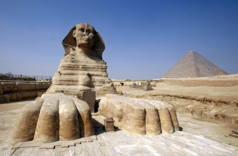 The Great Sphinx of Giza, a large half-h