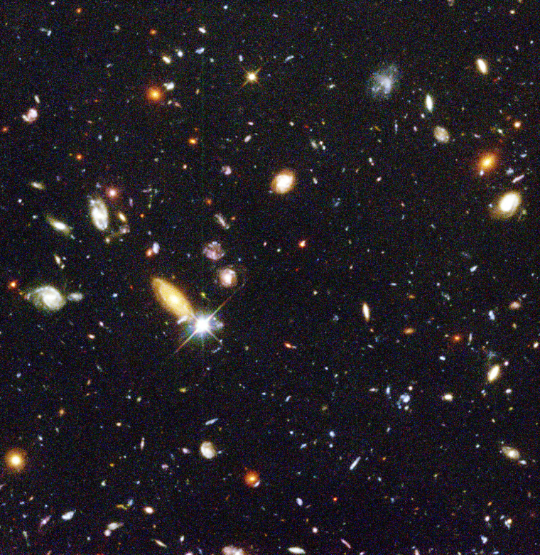 January 15, 1996: One peek into a small part of the sky, one giant leap back in time. The Hubble telescope has provided mankind's deepest, most detailed visible view of the universe. 
Representing a narrow \"keyhole\" view stretching to the visible horizon of the universe, the Hubble Deep Field image covers a speck of the sky only about the width of a dime 75 feet away. Though the field is a very small sample of the heavens, it is considered representative of the typical distribution of galaxies in space, because the universe, statistically, looks largely the same in all directions. Gazing into this small field, Hubble uncovered a bewildering assortment of at least 1,500galaxies at various stages of evolution.