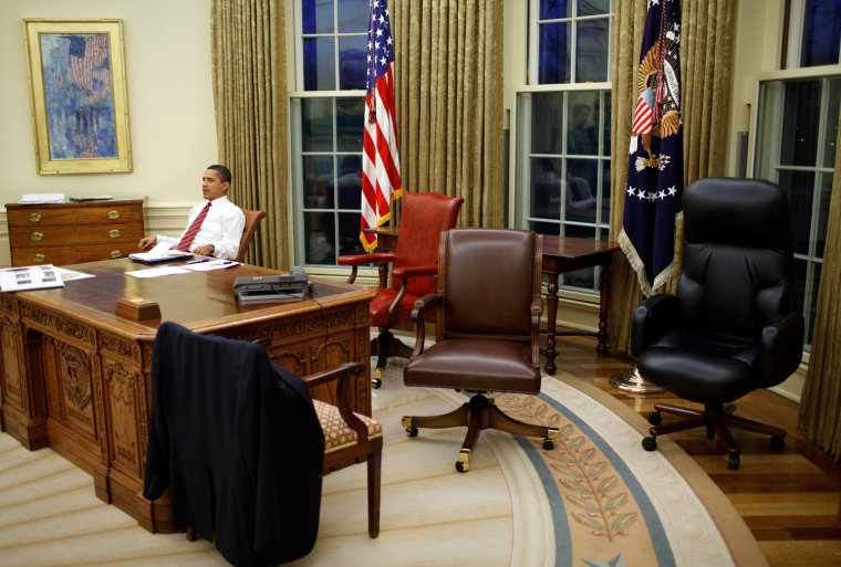 President Barack Obama tries out different desk chairs in the Oval Office 1/30/09.
Official White House Photo by Pete Souza