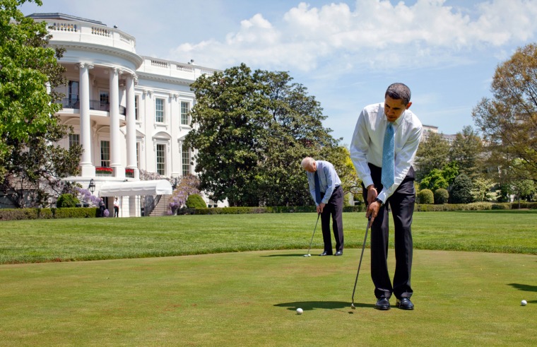 President Barack Obama and Vice President  Joe Biden practice their putting on the White House putting green April 24, 2009. Official White House Photo by Pete Souza