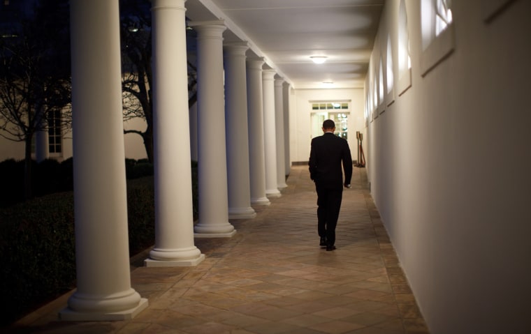 President Barack Obama walks along along the Colonnade toward the Oval Office. 2/26/09. 
Official White House Photo by Pete Souza