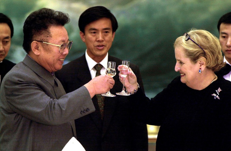 North Korean leader Kim Jong Il (L) toasts US Secr