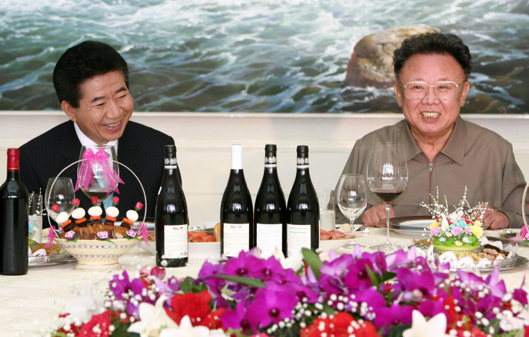 South Korean President Roh Moo-hyun, left, smiles with North Korean leader Kim Jong Il at a farewell lunch in Pyongyang, North Korea, Thursday, Oct. 4, 2007. The leaders of North and South Korea signed a wide-ranging reconciliation pact Thursday pledging to finally seek a peace treaty to replace the 54-year-old cease-fire that ended the Korean War. (AP Photo/ Korea Pool via Yonhap)  **KOREA OUT**