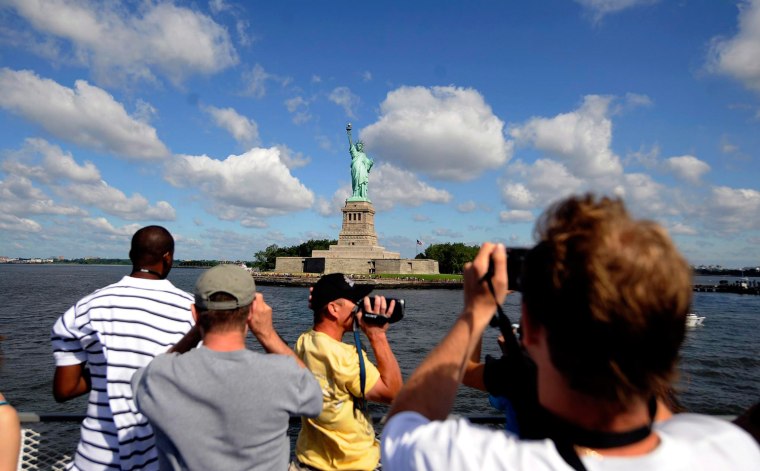 Image: Statue of Liberty Draws Sightseers on America's Indepedence Day