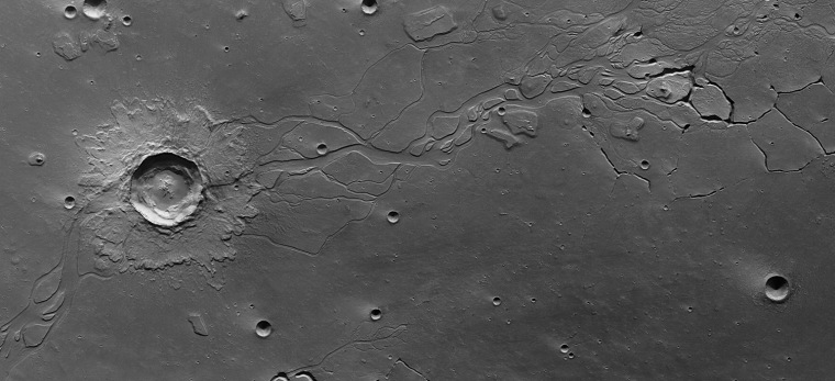 This image of Hephaestus Fossae was obtained by ESAÕs Mars Express orbiter on 28 December 2007. The region is dotted with craters and channel systems and lies at about 21¡N and 126¡E on the Red Planet. Named after the Greek god of fire, Hephaestus Fossae extends for more than 600 km on the western flank of Elysium Mons in the Utopia Planitia region.