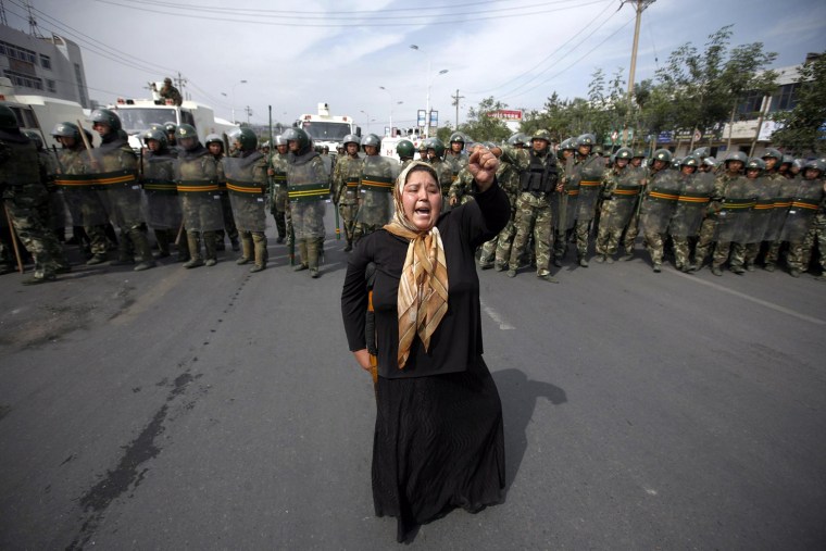 Image: Ethnic Uygur demonstrate in Urumqi a day after violent protests left over 140 people dead according to official estimates, Xinjiang province, China, 07 July 2009.