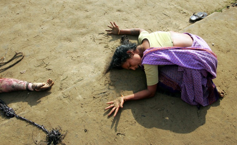 Indian woman mourns death of her relative killed in tsunami in Cuddalore.