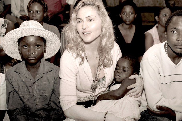 Publicity photo of pop star Madonna and the Malawi child she hopes to adopt, Mercy