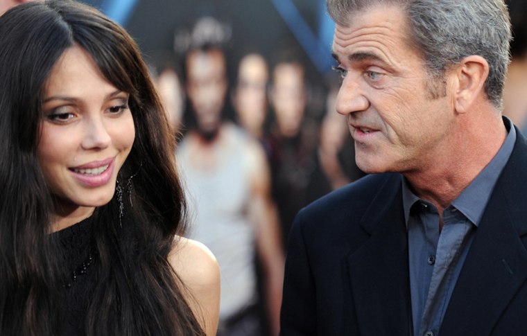 Actor Mel Gibson (R) and his guest Oksan