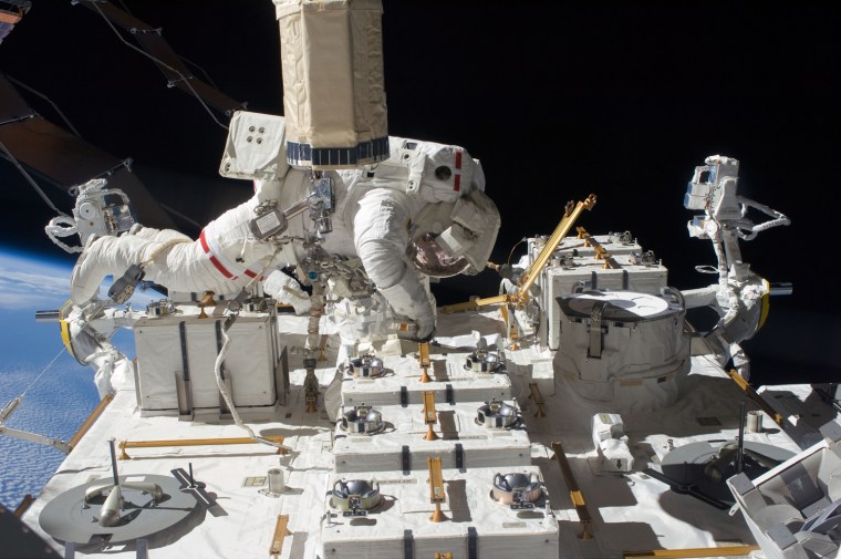 Astronaut Tom Marshburn, STS-127 mission specialist, participates in the mission's fifth and final session of extravehicular activity (EVA) as construction and maintenance continue on the International Space Station. During the four-hour, 54-minute spacewalk, Marshburn and astronaut Christopher Cassidy (out of frame), mission specialist, secured multi-layer insulation around the Special Purpose Dexterous Manipulator known as Dextre, split out power channels for two space station Control Moment Gyroscopes, installed video cameras on the front and back of the new Japanese Exposed Facility and performed a number of \"get ahead\" tasks, including tying down some cables and installing handrails and a portable foot restraint to aid future spacewalkers.