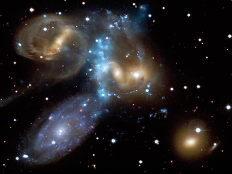 Stephan's Quintet--A Galaxy Collision in Action
Stephan's Quintet, a compact group of galaxies discovered about 130 years ago and located about 280 million light years from Earth, provides a rare opportunity to observe a galaxy group in the process of evolving from an X-ray faint system dominated by spiral galaxies to a more developed system dominated by elliptical galaxies and bright X-ray emission. Being able to witness the dramatic effect of collisions in causing this evolution is important for increasing our understanding of the origins of the hot, X-ray bright halos of gas in groups of galaxies.