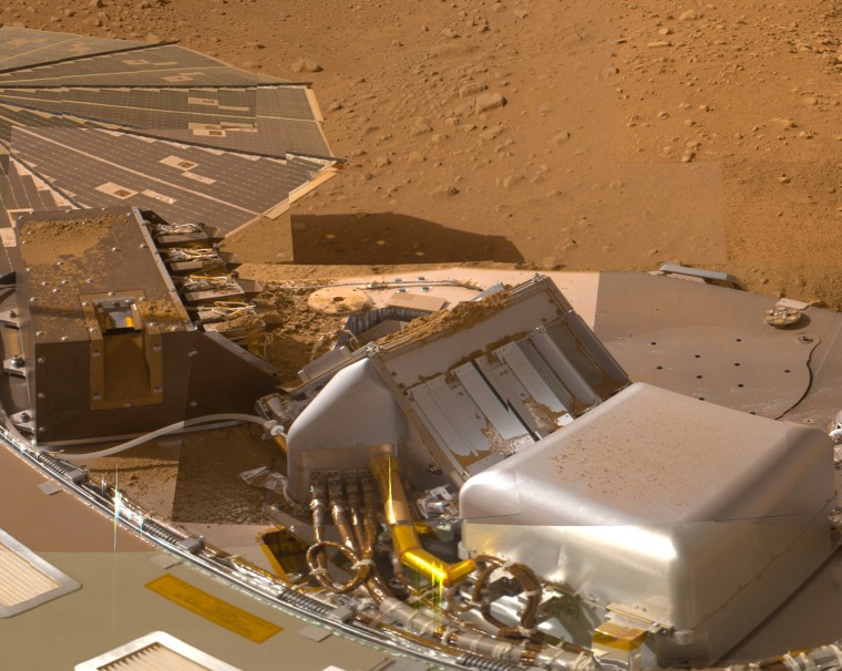This mosaic of images from the Surface Stereo Imager camera on NASA's Phoenix Mars Lander shows a portion of the spacecraft's deck after deliveries of several Martian soil samples to instruments on the deck. 

In the center and right foreground is the Thermal and Evolved-Gas Analyzer. On the left is the Microscopy, Electrochemistry and Conductivity Analyzer. 

The component images for this approximately true color view were taken on various dates during the five months that Phoenix studied its surroundings after landing on a Martian arctic plain on May 25, 2008. 

The Phoenix Mission was led by the University of Arizona, Tucson, on behalf of NASA. Project management of the mission was by NASA's Jet Propulsion Laboratory, Pasadena, Calif. Spacecraft development was by Lockheed Martin Space Systems, Denver.
