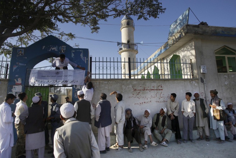 Image: Afghan voters line up to cast their ballots