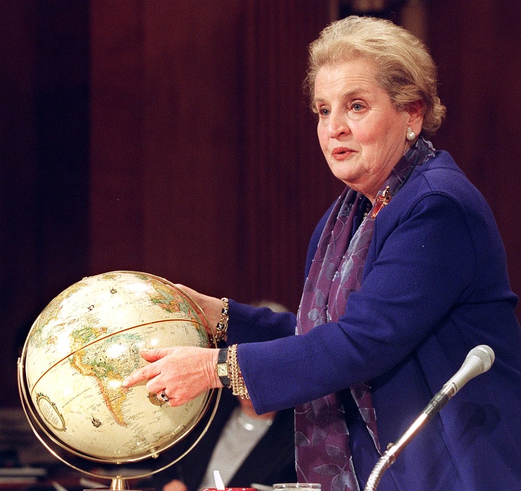 US Secretary of State Madeleine Albright points to