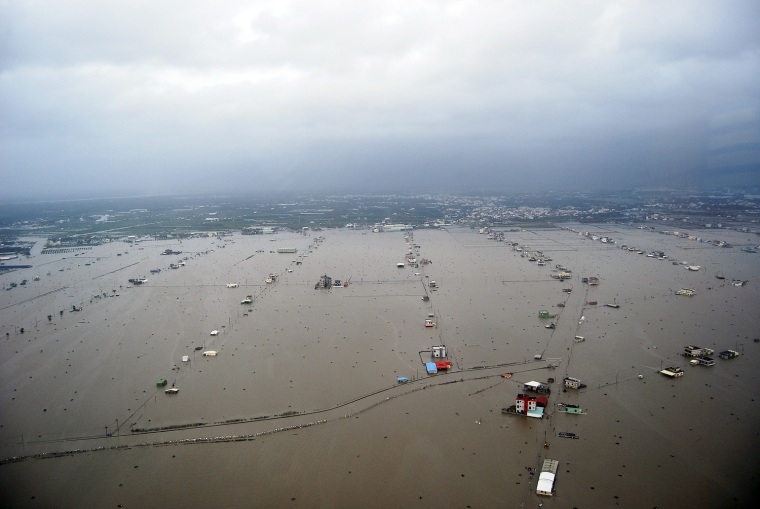 Image: An aerial picture shows the floods after Typhoon Morakot hit Pingtung county, southern Taiwan