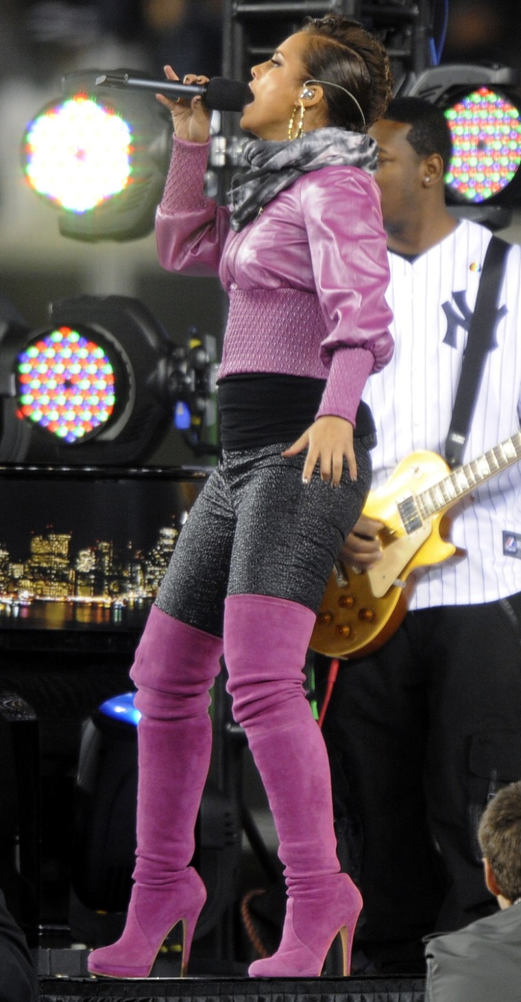 Recording artist Alicia Keys performs with Jay-Z at Yankee Stadium before the start of Game 2 of the 2009 MLB World Series in New York
