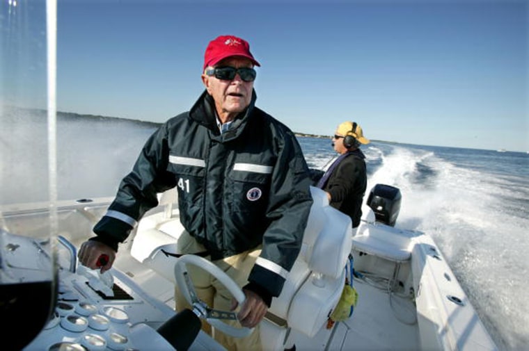 Former President George. H. W. Bush Pilots His Speed Boat