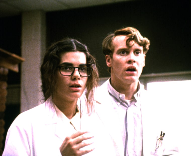 LOVE POTION NO. 9, Sandra Bullock, Tate Donovan, 1992, lab coat

(from wikipedia) Bullock was once engaged to actor Tate Donovan whom she met while filming Love Potion No. 9. Their relationship lasted four years.[