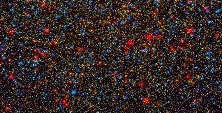 NASA's Hubble Space Telescope snapped this panoramic view of a colorful assortment of 100,000 stars residing in the crowded core of a giant star cluster.
The image reveals a small region inside the massive globular cluster Omega Centauri, which boasts nearly 10 million stars. Globular clusters, ancient swarms of stars united by gravity, are the homesteaders of our Milky Way galaxy. The stars in Omega Centauri are between 10 billion and 12 billion years old. The cluster lies about 16,000 light-years from Earth.
This is one of the first images taken by the new Wide Field Camera 3 (WFC3), installed aboard Hubble in May 2009, during Servicing Mission 4. The camera can snap sharp images over a broad range of wavelengths.
