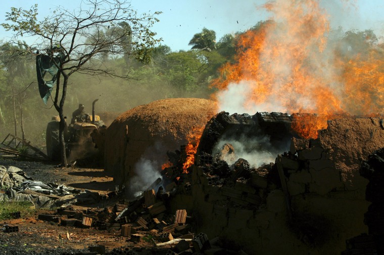Image: Illegal coal furnaces are destroyed during a raid operation aimed to protect the cerrado in Niquelandia