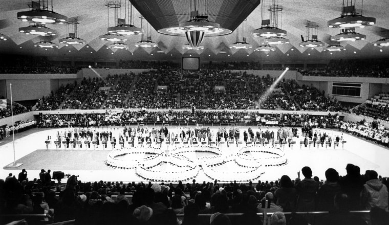 Japanese girls from Olympic rings in the center of the Makomanai ice arena during the closing ceremony of the Winter Olympic, Feb. 13, 1972, Sapporo, Japan. (AP Photo)