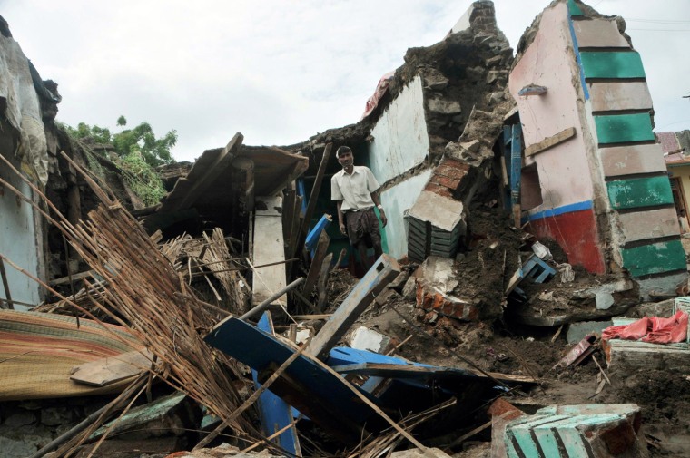 Image: INDIA-Damaged house due to floods in Siraguppe village, Bellary district in North Karnataka about 500km from southern Indian City of Bangalore.