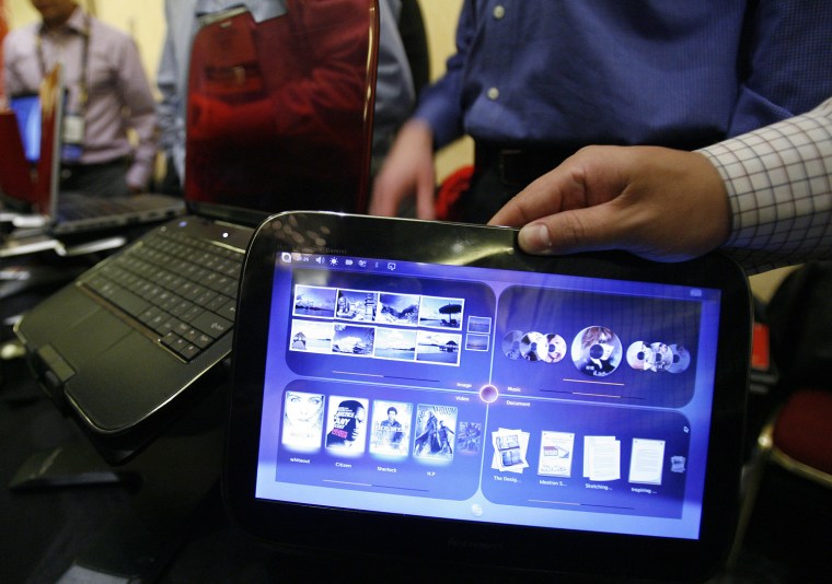 Image: A Lenovo IdeaPad U1 Hybrid laptop is displayed during a media preview for the 2010 International CES in Las Vegas