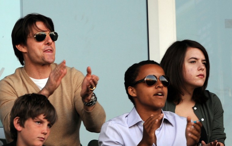 Actor Tom Cruise (L) and his children Co