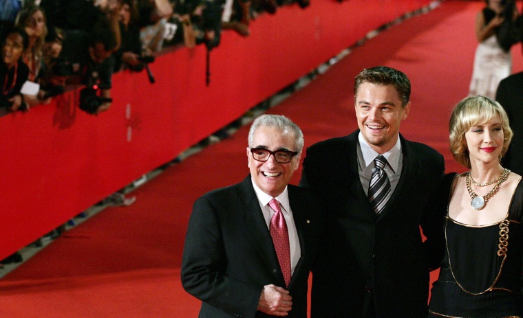US actors Leonardo DiCaprio (C) and Vera