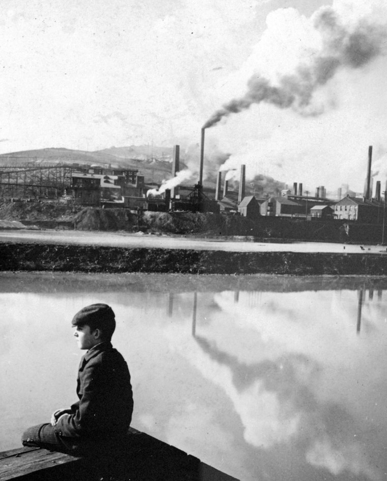 Boy and smelters at Butte, Mont., c. 1904.