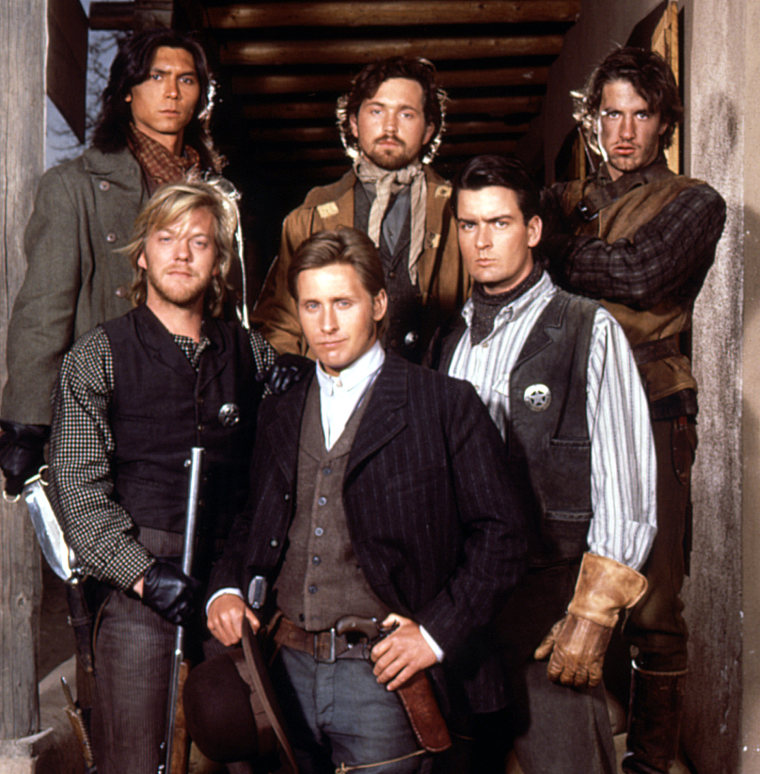 YOUNG GUNS, (back l-r): Lou Diamond Phillips, Casey Siemaszko, Dermot Mulroney, (front l-r): Kiefer Sutherland, Emilio Estevez, Charlie Sheen, 1988

Western adventure, based on a true story, about six young men hired to guard an Englishman's ranch against a mob in 1870s New Mexico.