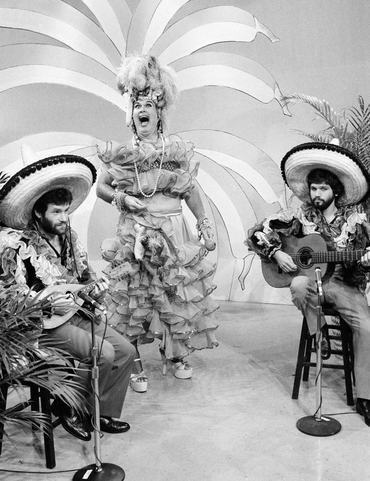 Willard Scott, the weatherman of the NBC TV Today Show, performs a Carmen Miranda impersonation during the show on Monday, August 20, 1983, in New York City, in exchange for a $1000 donation to the USO. (AP Photo)