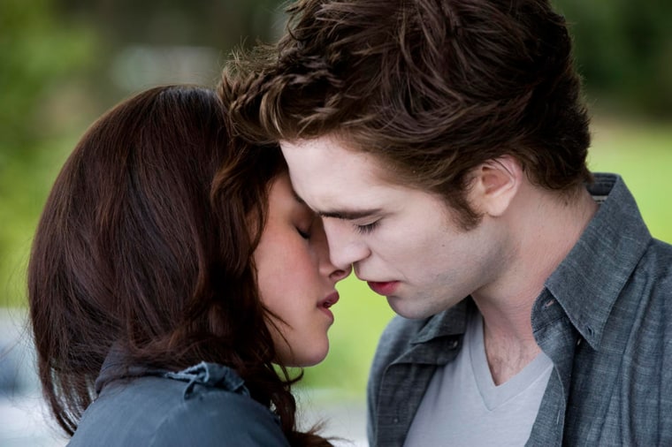 The Twilight Saga: New Moon (L-R) Kristen Stewart as Bella and Robert Pattinson as Edward Cullen
In \"New Moon,\" Bella Swan (Kristen Stewart) is devastated by the abrupt departure of her vampire
love Edward (Robert Pattinson) but her spirit is rekindled by her growing friendship with the irresistible Jacob Black (Taylor Lautner). Suddenly she finds herself drawn into the world of the werewolves, ancestral enemies of the vampires, and she finds her loyalties tested