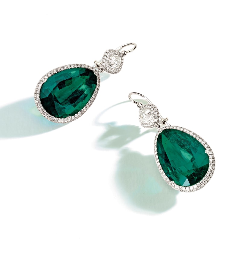 Lot 545
Pair of Emerald and Diamond Pendant-Earrings
Pear-shaped emeralds weighing 10.58 and 9.76 carats, square cushion-shaped and round diamonds weighing approximately 2.50 carats, mounted in platinum.
Est. $350/450,000