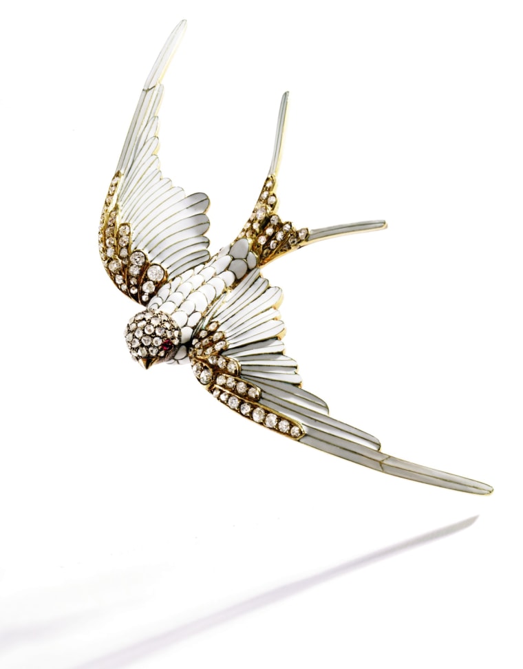 Property of a New York Collector
Diamond and Enamel Swallow Brooch/Hair Ornament Combination, Circa 1890
Rose-cut and old mine diamonds weighing approximately 1.00 carat, applied with white enamel, mounted in 10 karat gold
Est. $30/40,000