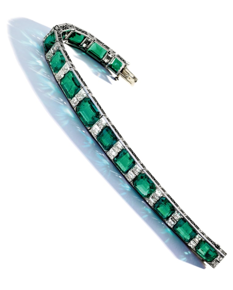 Property from a Private Collection
Emerald and Diamond Bracelet, Tiffany & Co., Circa 1925
The octagonal and rectangular step-cut emeralds weighing approximately 39.60 carats, spaced by square emerald-cut diamonds weighing approximately 9.50 carats, mounted in platinum
Est. $350/550,000