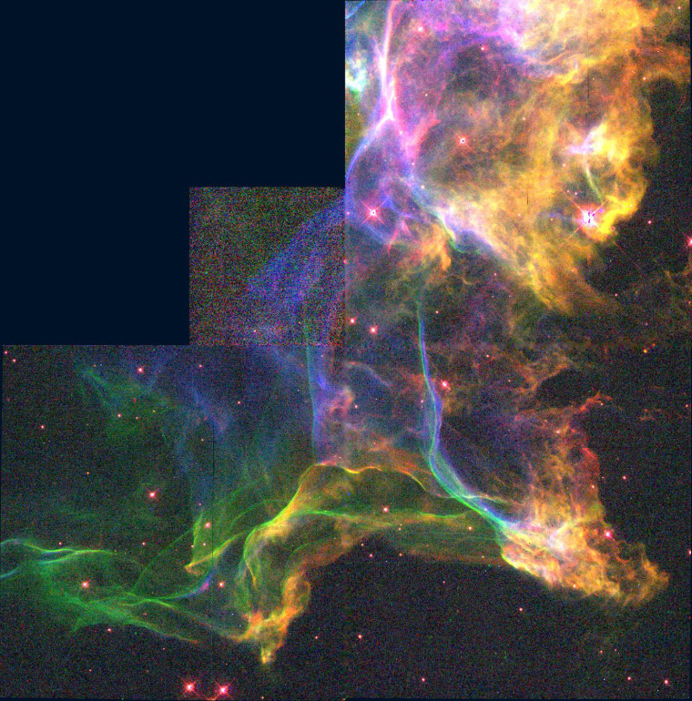 A nebula\"s neon colors
A nebula known as the Cygnus Loop is actually the expanding blast wave from a supernova. The blast has hit a cloud of dense interstellar gas-causing the gas to glow.