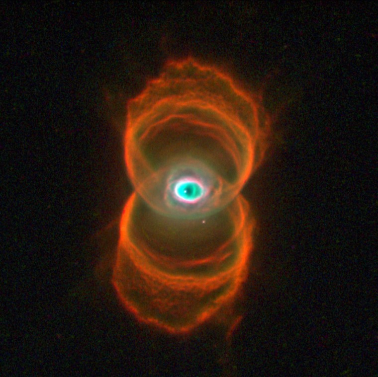 Eye of heaven
This celestial object, with the scientific name MyCn18, looks like an eerie green eye staring out from two intersecting rings. But it\"s actually an intricately shaped \"hourglass\" nebula with a star at its center.