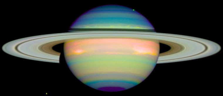 Surrealistic Saturn
 
 
A false-color image shows infrared light reflected from the planet Saturn. The different hues help scientists discern different levels of the planet's thick atmosphere. Two of Saturn's moons - Dione and Tethys - are visible as specks on the image.
