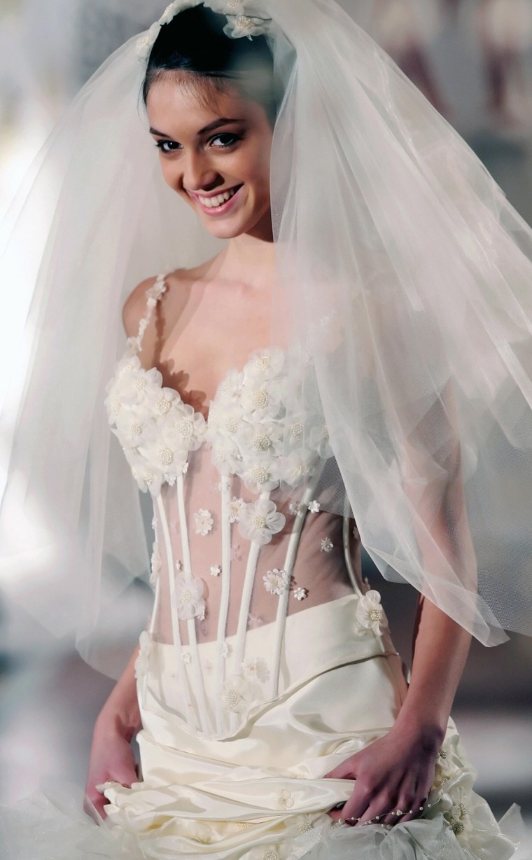 A model presents a wedding dress in Sofi