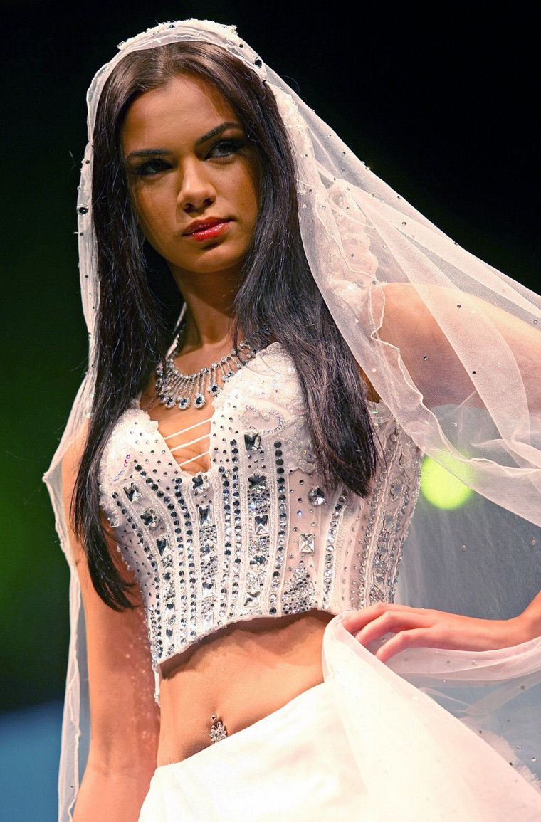 A model displays a wedding dress from th