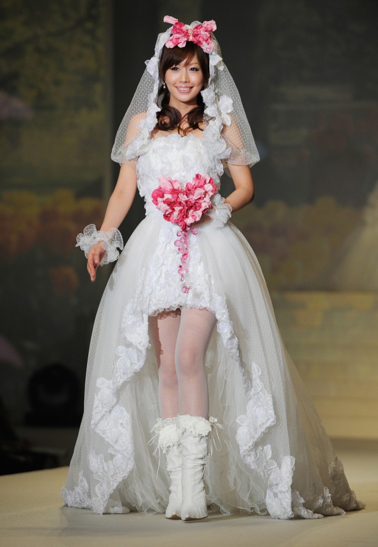 A model shows off a wedding dress by Jap