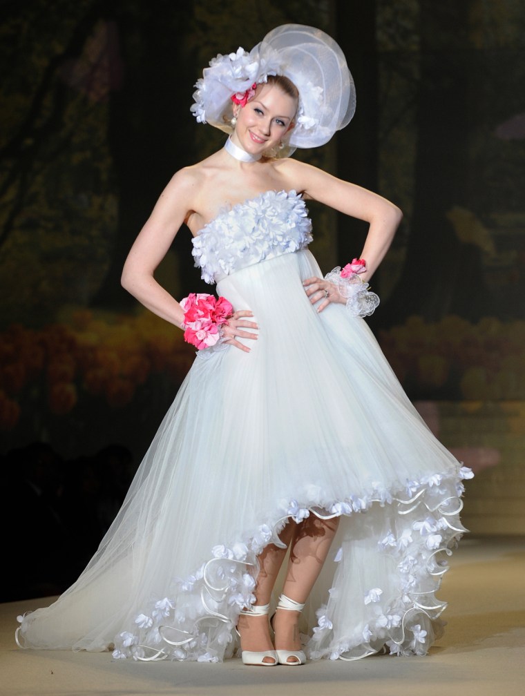 A model shows off a wedding dress by Jap