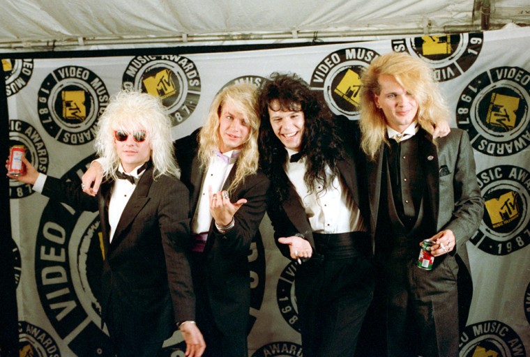 Rock band Poison poses at the MTV Video Music Awards in Los Angeles, Ca., Sept. 11, 1987.  From left to right are, C.C. Deville, Bret Michaels, Bobby Dall and Rikki Rockett.  (AP Photo/Lennox McLendon)