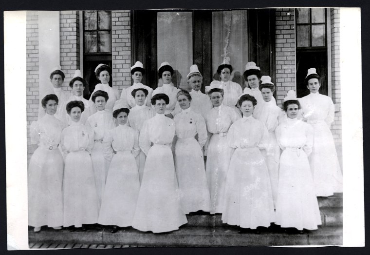 \"The Sacred Twenty\"-the first Navy nurses, 1908.

US Naval Historical Center

Group photograph of the first twenty Navy Nurses, appointed in 1908. Taken at the Naval Hospital, Washington, D.C., circa October 1908.
Present in the front row are (from left to right):
Mary H. Du Bose;
Adah M. Pendleton;
Elizabeth M. Hewitt;
Della V. Knight;
Josephine Beatrice Bowman, the third Superintendent of the Navy Nurse Corps, 1922-1935;
Lenah H. Sutcliffe Higbee, the second Superintendent of the Navy Nurse Corps, 1911-1922;
Esther Voorhees Hasson, the first Superintendent of the Navy Nurse Corps, 1908-1911 ;
Martha E. Pringle;
Elizabeth J. Wells; and
Clare L. De Ceu.
In the back row are (left to right):
Elizabeth Leonhardt;
Estelle Hine;
Ethel R. Parsons;
Florence T. Milburn;
Boniface T. Small;
Victoria White;
Isabelle Rose Roy;
Margaret D. Murray;
Sara B. Myer; and
Sara M. Cox.
(The last two named are on a lower step than the rest of the back ro