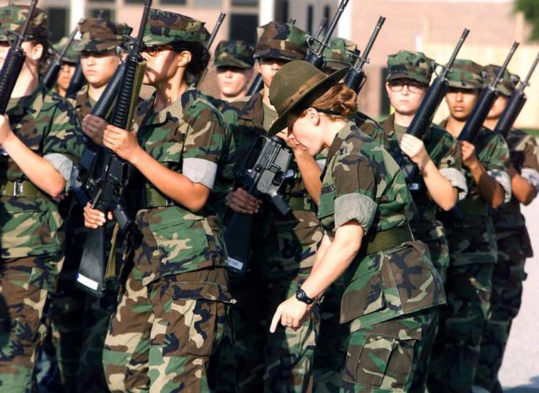 Released to Public
ID:	DMSD0105325	Service Depicted: Marines 
000822M1050F001
US Marine Platoon 4033 practices close order drill as 4th Battalion Drill Instructor Staff Sergeant Love (Right, pointing down) monitors their effort. The female recruits are practicing on the 4th Battalion Parade Deck, Marine Corps Recruit Depot, Parris Island, South Carolina, on August 22nd, 2000.
Location: MCRD, PARRIS ISLAND, SOUTH CAROLINA (SC) UNITED STATES OF AMERICA (USA)
Camera Operator: LCPL DAVID R. FLORES, USMC 	Date Shot: 22 Aug 2000