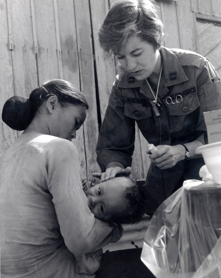 Air Force nurse Captain Bettie J. Vierra tends to a Vietnamese child during MEDCAP, Vietnam, 1970 or 1971.

Bettie J. Vierra Collection, Women In Military Service For America Memorial Foundation, Inc.