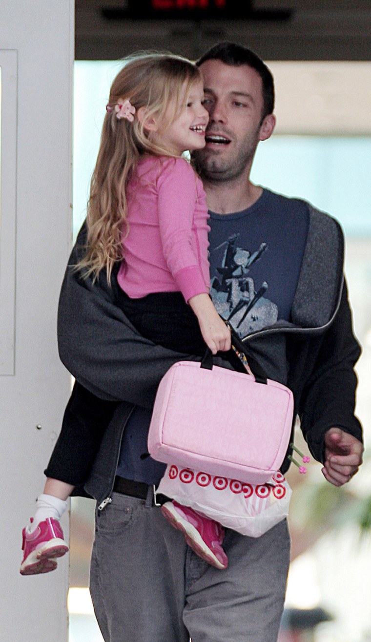Daddy's girl! Ben Affleck picks up a very cheerful Violet from school as she holds her pink lunchbox to match her pink outfit