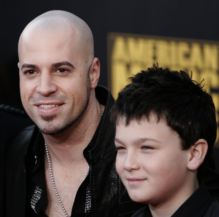 Image: Musician Daughtry and his son Griffin arrive at the 2009 American Music Awards in Los Angeles